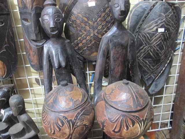 palawan wood carvings man woman covered bowls